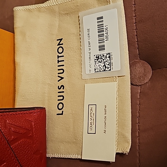 Authentic Louis Vuitton Victorine Empreinte Trifold Leather Wallet - Picture 13 of 16